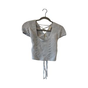 Blue knit low cut top with lace up back